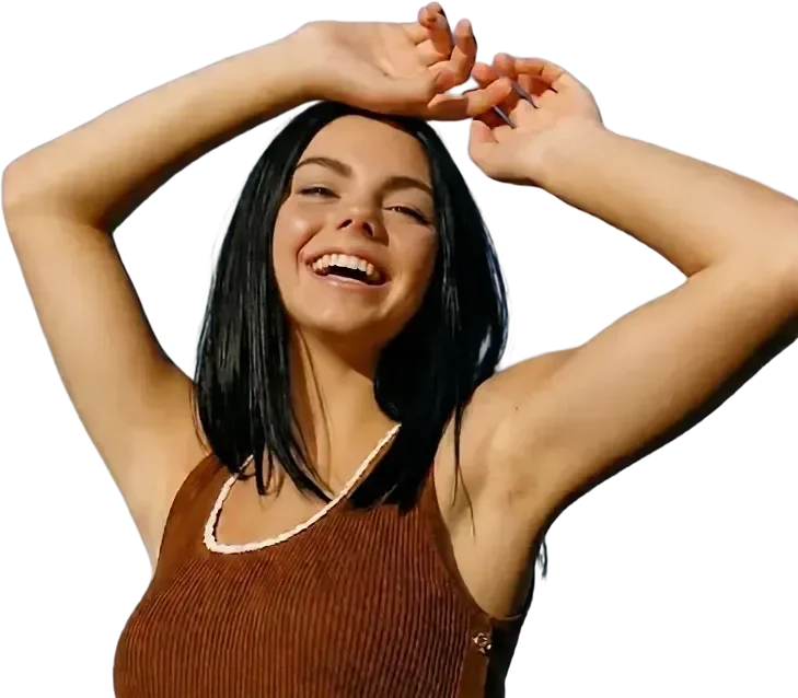 Smiling woman with clear, healthy skin, arms raised