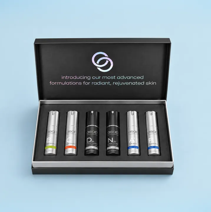 The six serums of the Signature Serum Collection arranged on a Valentine’s gift box